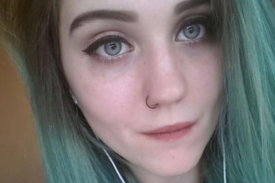 Man, 18, charged with murder and false imprisonment of young woman who fell to her death from block of flats