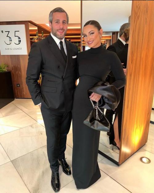 Sam Faiers and her partner posing for a photo.