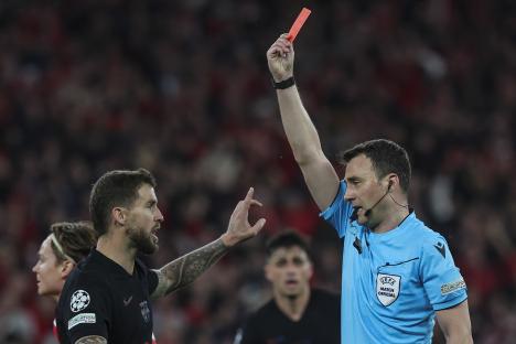 Referee showing a red card.