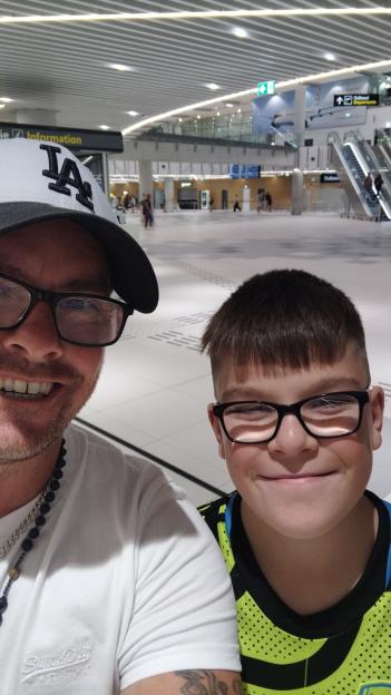 Darren Rainey and his son Oscar Rainey at the airport.
