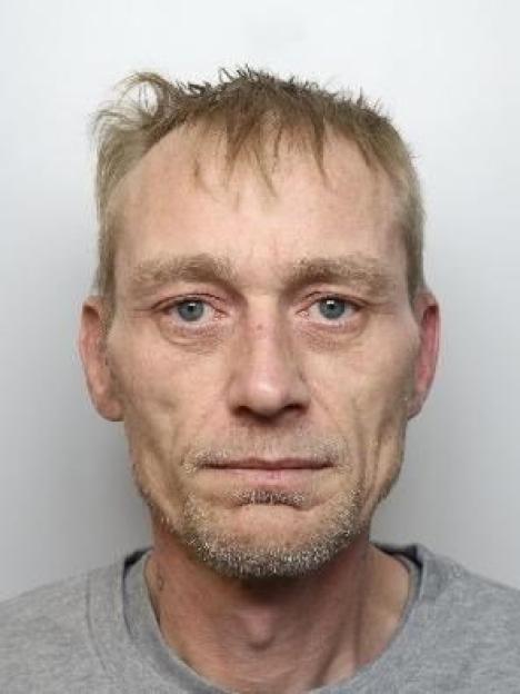 Dramatic moment man who murdered his love rival is found hiding inside a shed