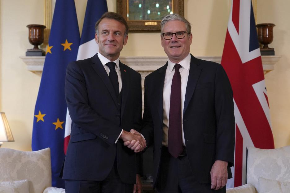 Britain's Prime Minister Keir Starmer and France's President Emmanuel Macron shaking hands.