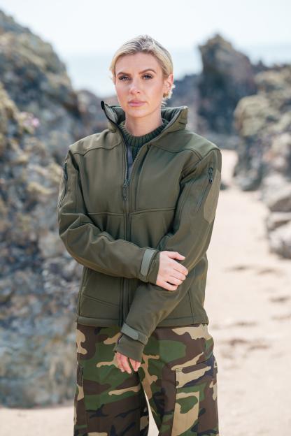 Chloe Burrows on a beach.