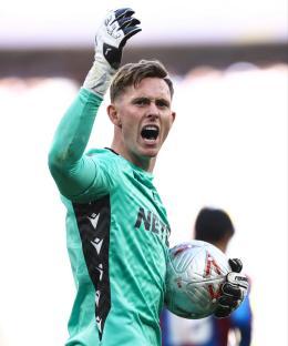 Dean Henderson, Crystal Palace goalkeeper, celebrates a penalty save.