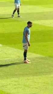 Soccer player Ruben Dias on the field.