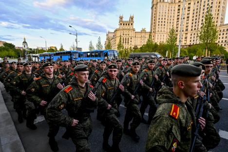 Troops marching towards Red Square in Moscow.