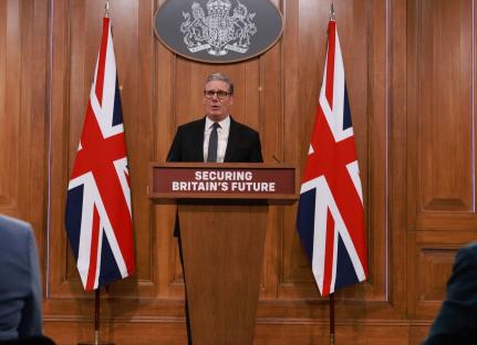 Sir Keir Starmer speaking at a press conference about the UK Immigration White Paper.