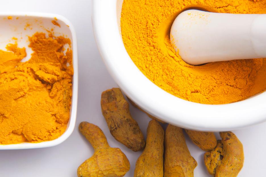 Turmeric powder, paste, and roots.