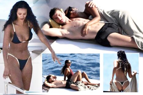 Maya Jama looks incredible in tiny bikini as she snuggles up to boyfriend Ruben Dias on deck of luxury yacht
