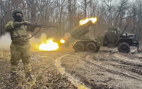 Russian serviceman firing a BM-21 Grad multiple rocket launcher.