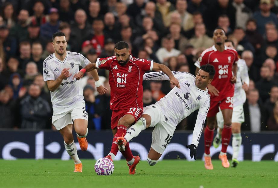 Mohamed Salah in action with Casemiro during the Liverpool v Manchester United match.