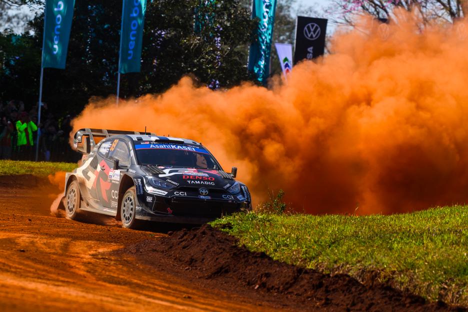 Kalle Rovanpera and Jonne Halttunen drive the Toyota GR Yaris Rally1 kicking up orange dust during the FIA World Rally Championship in Encarnacion, Paraguay.