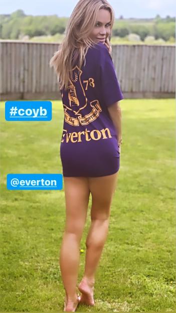 Amanda Holden in an Everton football shirt.