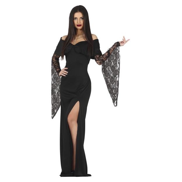 A woman with long dark hair, dark lipstick, and a black off-the-shoulder dress with a thigh-high slit and bell sleeves made of lace, stands facing the camera, with her left hand on her hip and right hand raised.