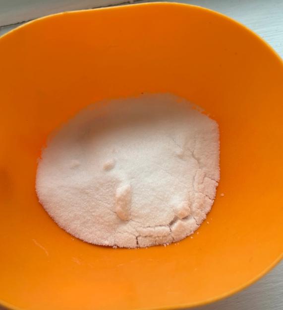 Salt in an orange bowl.