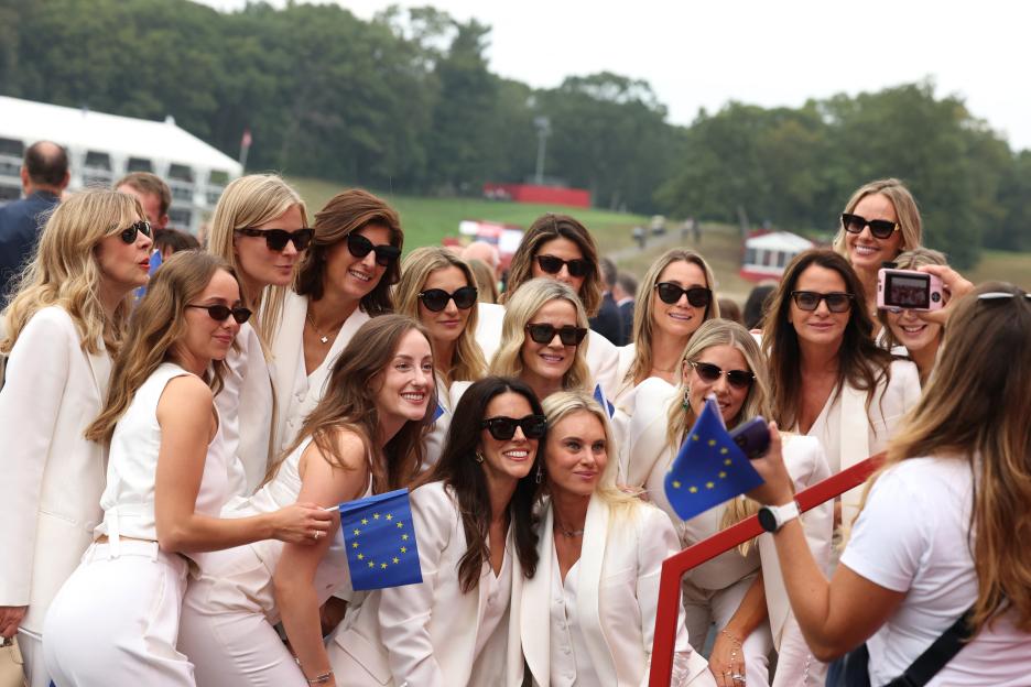 The partners of Team Europe pose for a photograph during the opening ceremony.
