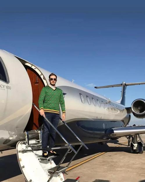 Man boarding a private jet.