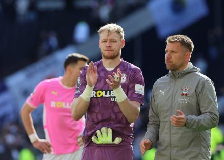 Aaron Ramsdale of Southampton, dejected, with a coach.
