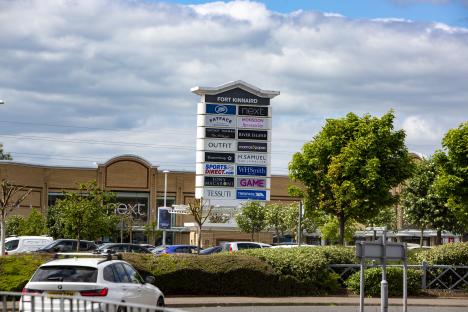 Fort Kinnaird shopping center sign with store names.