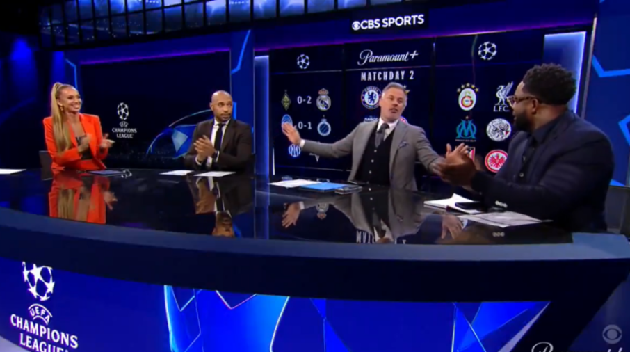 Four commentators on a CBS Sports Champions League broadcast desk.
