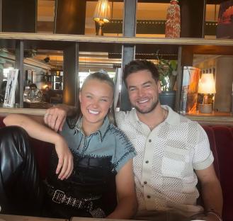 Photo of two people sitting together.