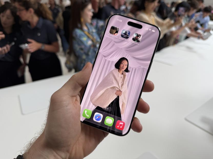 iPhone displaying fashion photo and game icons.
