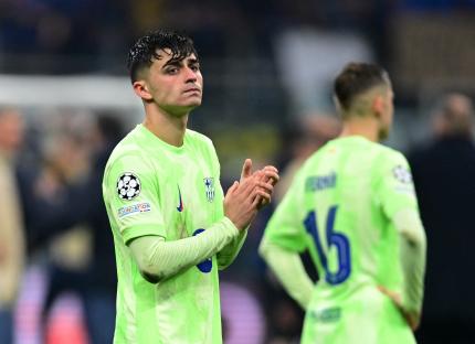 Pedri of FC Barcelona looking dejected after a soccer match.