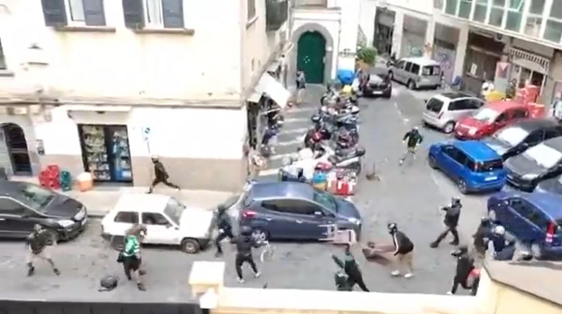 Unbelievable Chaos: Football Fans Hurl CHAIRS in Massive Street Brawl Ahead of Champions League Showdown!