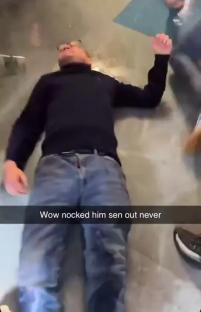 Person lying on the floor.