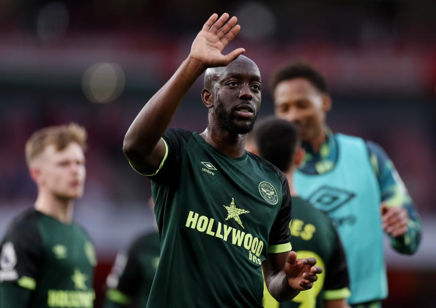 Yoane Wissa of Brentford acknowledges fans.