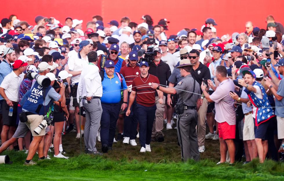 Rory McIlroy and Tommy Fleetwood of Team Europe on the first during the morning foursomes on day two of the Ryder Cup.