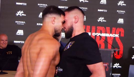 Tommy Fury shoving opponent Kenan Hanjalic at a press conference.