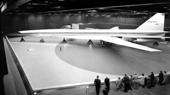 Boeing 2707 supersonic jet in a hangar.