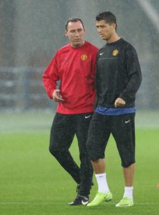 YOKOHAMA, JAPAN - DECEMBER 17: Cristiano Ronaldo and Rene Meulensteen of Manchester United take part in a First Team Training Session ahead of the World Club Cup at Yokohama International Stadium on December 17 2008 in Yokohama, Japan. (Photo by John Peters/Manchester United via Getty Images)