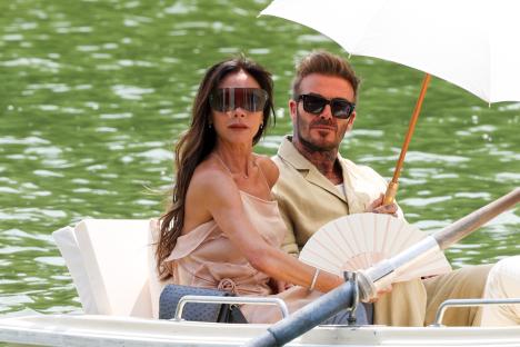 David and Victoria Beckham on a boat.