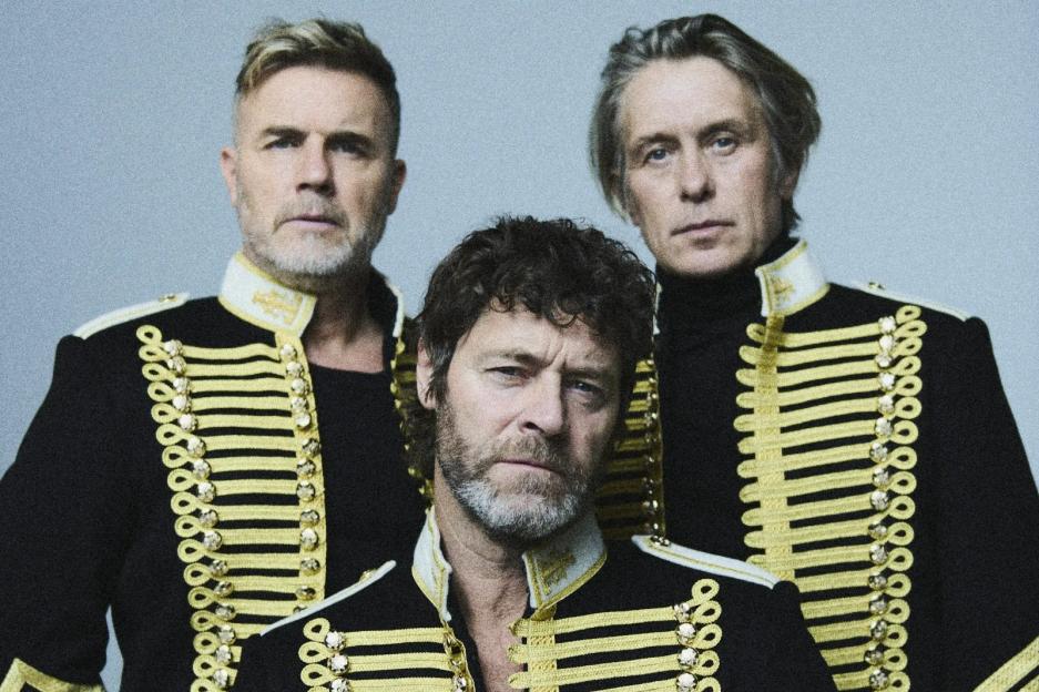 Take That in military-style uniforms for The Circus 2025 tour.