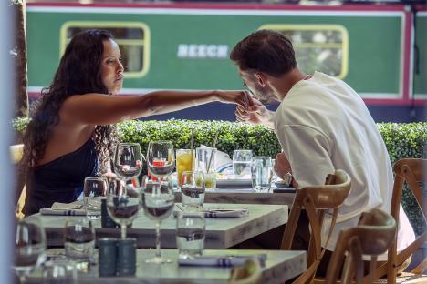 Maya Jama and Ruben Dias on a date at a restaurant.