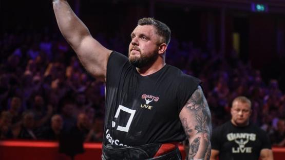 Who is Luke Stoltman and how has the powerlifter performed in World’s Strongest Man events?