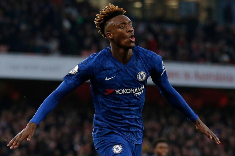 Chelsea striker Tammy Abraham celebrating a goal against Arsenal.