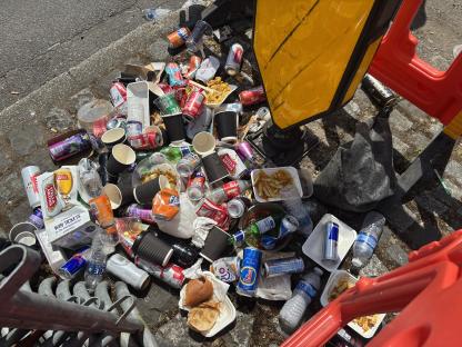 Hundreds of travellers flock to 800-year-old horse fair as street races close down town and rubbish piles up