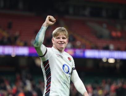 Henry Pollock of England celebrates a rugby victory.