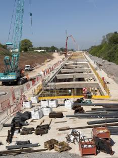 HS2 construction site in Burton Green, Warwickshire, showing a large tunnel under construction.