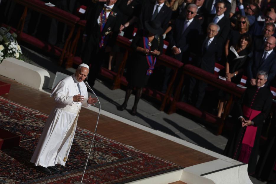 Pope Leo XIV addressing a crowd in St. Peter's Square.