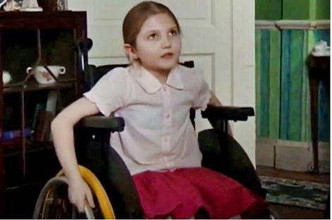 Mia McKenna-Bruce in a wheelchair.