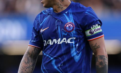 Close-up of Enzo Fernandez's Chelsea jersey, showing the Damac sponsorship.
