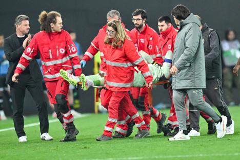 Tammy Abraham slumps to his knees and PRAYS after AC Milan team-mate is rushed to hospital after horrific head injury