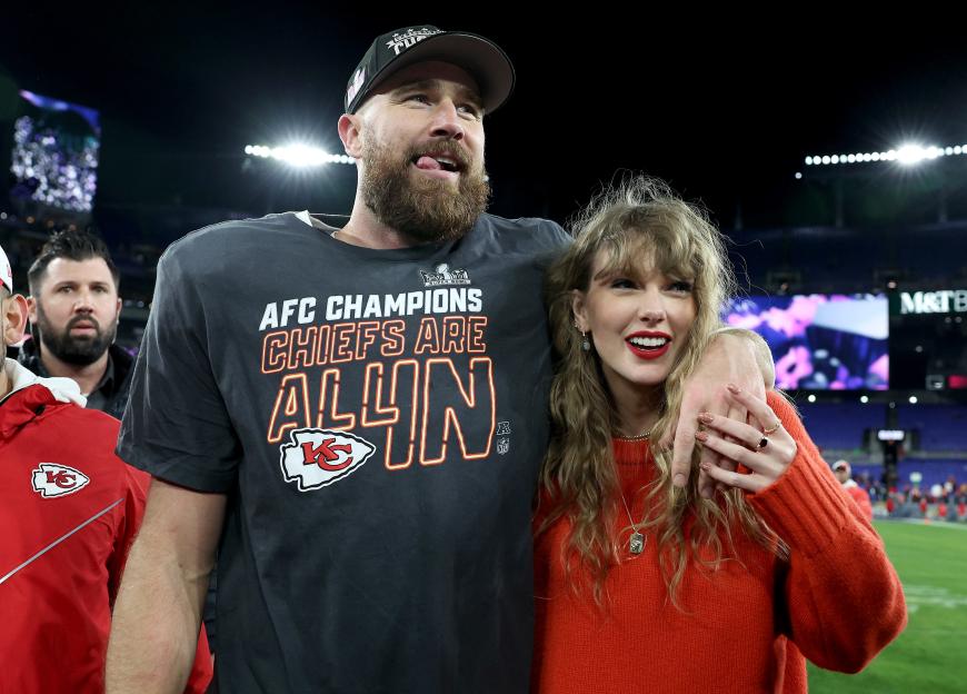 Travis Kelce and Taylor Swift celebrating after the AFC Championship Game.