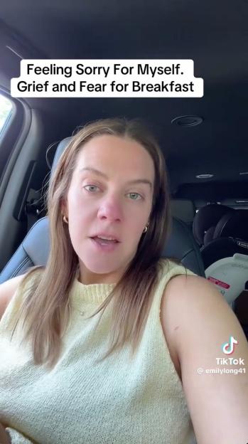 Screenshot of a TikTok video showing a woman in a car, stating, "Feeling Sorry For Myself. Grief and Fear for Breakfast."