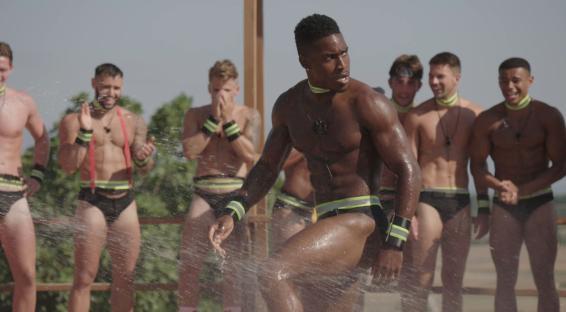 Idris Virgo participating in a Love Island challenge.