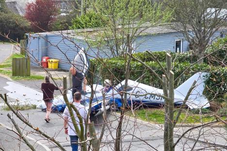 Moment plane plummets from the sky and crashes into UK holiday park before bursting into flames